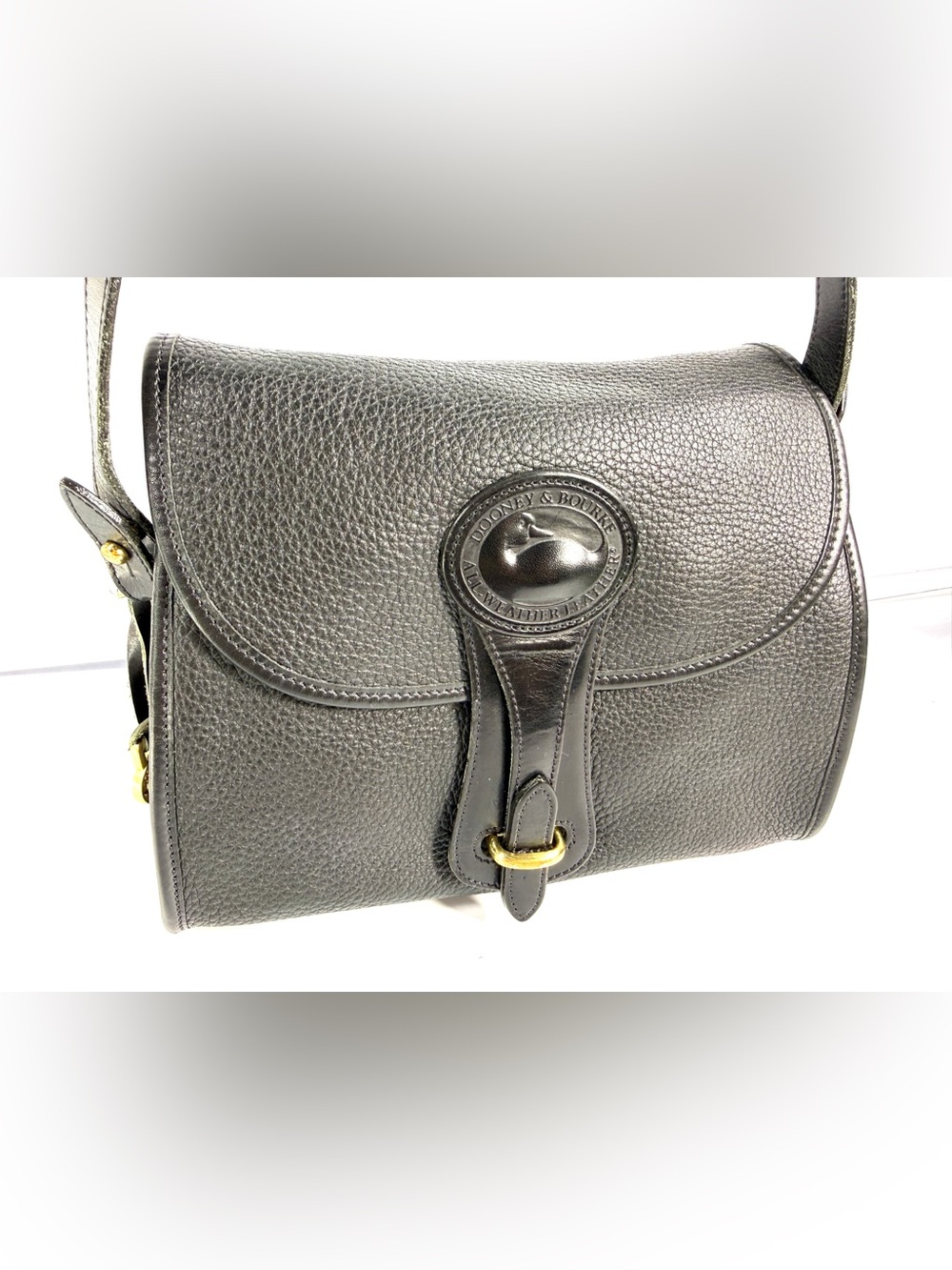 Dooney & Bourke Black Pebbled Leather Messenger with Gold-Tone Buckle